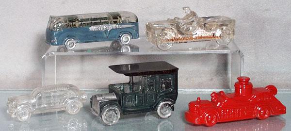 5 CANDY CONTAINER VEHICLES: painted & unpainted glass, Victory Lines Bus, Willy' Jeep, w/cardboard insert, Sedan, Town Car, w/tin roof, Fire Pumper, 4" to 5" long, C4-8.