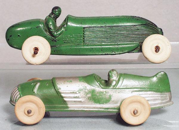 2 AUBURN RUBBER OPEN RACERS: both have some paint wear, white rubber tires, both 6 1/2" long, C4-6.