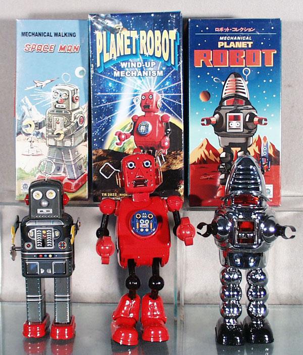 3 CONTEMPORARY ROBOTS: China, litho tin, windups working, Planet Robot, Planet Robot & Space Man, 8 1/2" to 9" tall, orig boxes, C9.