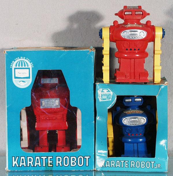 3 SEARS BIG TOY BOX KARATE ROBOTS: plastic, battery operated, only the blue one is working, 1 missing battery box cover, 2 are 6 3/4" tall, other is 8 1/2" tall, the small red one has worn & faded stickers and is missing peg from back,