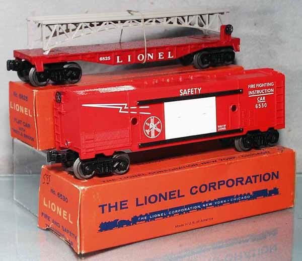 2 LIONEL FREIGHT CARS: O ga, 6825 flat car w/trestle bridge, 6530 fire safety car, orig boxes minor wear, C8-9.