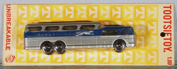 TOOTSIETOY GMC SCENIC CRUISER BUS: die cast, open rear wheel version, 7" long, sealed on orig card, C10.