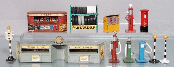 DINKY & JOHILLCO ACCESSORIES: die cast, Johillco Finlay Newsstand, Wardie Train Stand, Dinky 49 Petrol Pumps w/Oil Rack, 786 Tire Rack, 47A Traffic Signal, 760 Pillar Box, 2 Crossing Markings, C4-6.