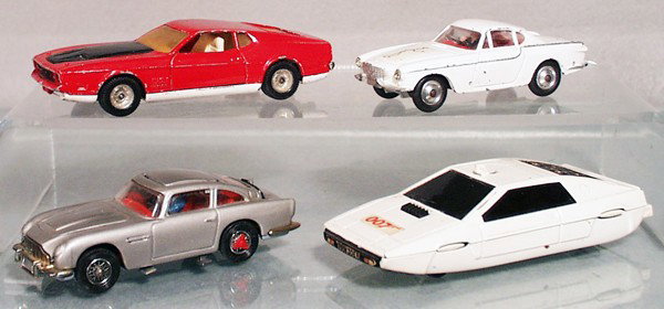 4 CORGI AUTOS: 391 James Bond Mustang, 201 Saint's Volvo, 270 James Bond Aston Martin DB5, all functions working, 269 James Bond Lotus Esprit, working, C5-6.