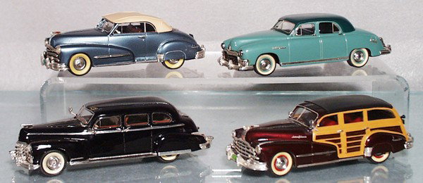 4 CONQUEST MODEL AUTOS: die cast, 1948 Pontiac Convertible, 1949 Frazer Sedan, 1947 Cadillac Fleetwood Limousine, 1948 Pontiac Woody Wagon, C8-9.