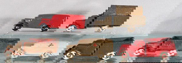 5 RUBBER TRUCKS: 4 Barr Rubber 1935 Ford Trucks - red Panel Truck, 2 green Army Trucks, 1 has a canopy, white Ambulance, Rainbow Rubber Studebaker, C4-5.