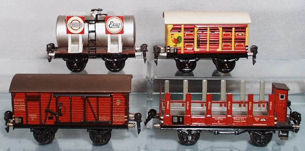 4 MARKLIN FREIGHT CARS: O ga, 16740 Esso tank, 16860 poultry, 17910 box car, 17720 goodswagen, C7-8.