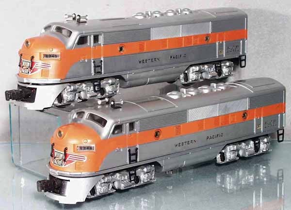 LIONEL 2345 WP F3 AA DIESELS: O ga, both have minor nose decal chips, power unit has small touch up spots on chassis & 1 spot on side of cab, orig boxes & master carton, master carton has 1 torn flap, C6-7.
