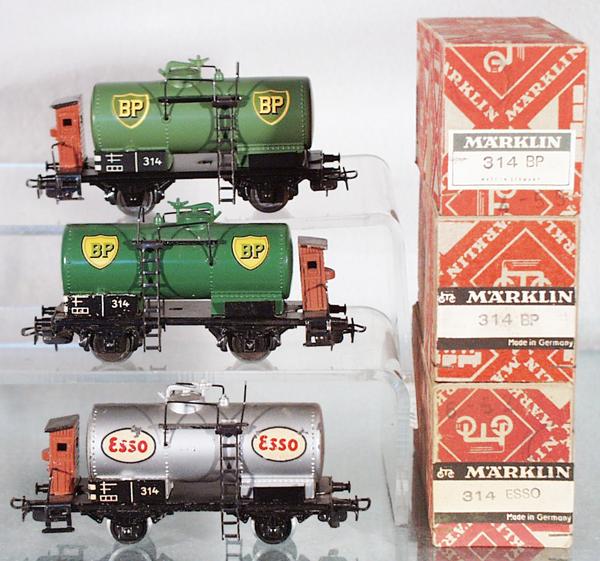 MARKLIN FREIGHT CARS: HO ga, 314 BP, green decals, restored, 314 BP, yellow decals, tank restored, both have repro boxes, 314 Esso, orig box, C5-9.