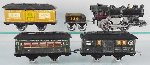AMERICAN FLYER TRAIN SET: O ga, 1094 electric loco, painted cast iron, 328 tender, 1204 baggage, missing couplers, 1104 Great Northern baggage, 1103 coach, C5-7.