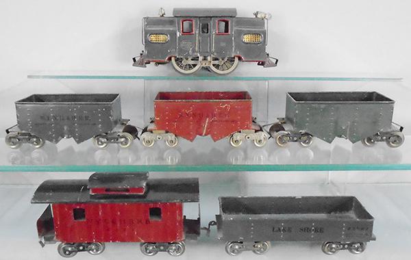 LIONEL TRAIN SET: std ga, 38 loco, gray, w/Mfg reverse, Corporation end plates, 116 ballast car, NY NH & HRR in green, maroon & gray, lever broken, 112 Lake Shore gondola, gray, 117 caboose, maroon, C5-7.