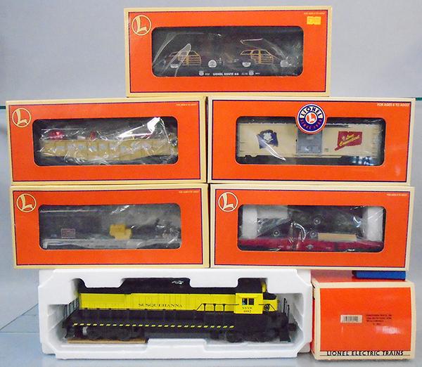 LIONEL TRAIN SET: O ga, 18211 Susquehanna loco w/horn, w/cars 17558, 29906, 17534, 36066, 26707, orig boxes & inserts minor wear, C8-9.