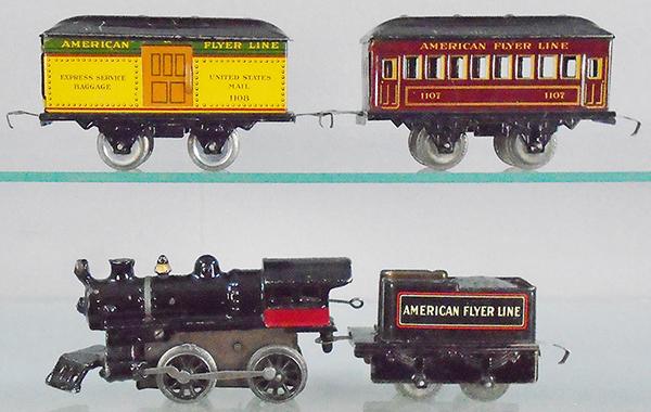 AMERICAN FLYER TRAIN SET: O ga, painted cast iron, #0 loco, windup working, 120 tender, unpunched frame, 1108 baggage, yellow & green, 1107 Pullman, brown & gold, C7-8.
