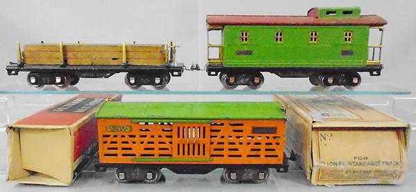 3 LIONEL FREIGHT CARS: std ga, 511 lumber, 517 caboose, 513 stock, 2 orig boxes only, boxes rough, C5-6.