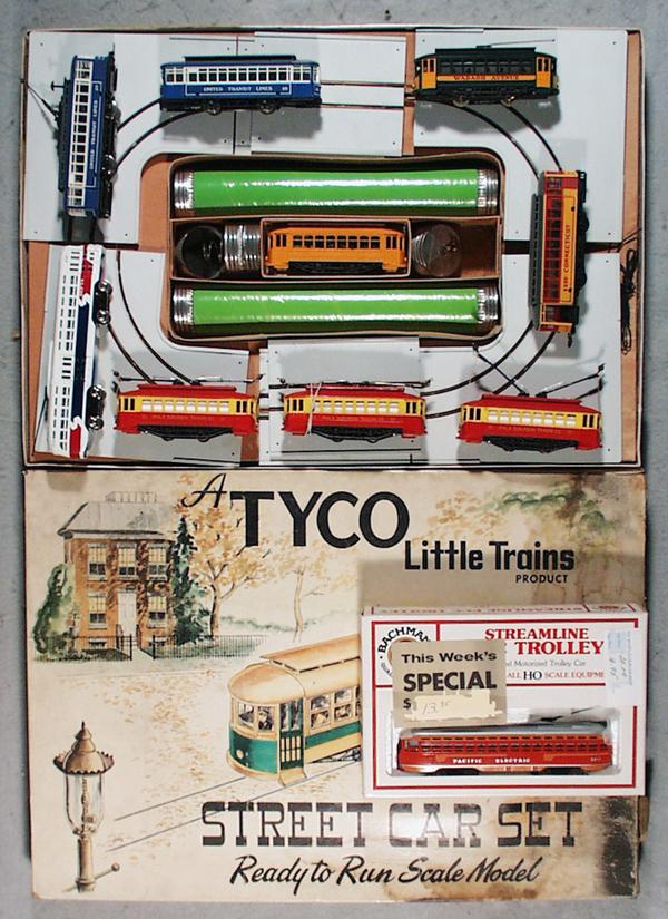 TYCO STREET CAR SET: HO ga, 2-rail, complete w/10 trolleys, orig box some wear, C7-9.