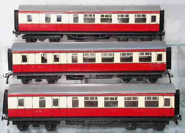 3 BASSETT-LOWKE 26233 3RD CLASS BRAKE END COACHES: O ga, red & cream, 1 coach scratched, C5-7.