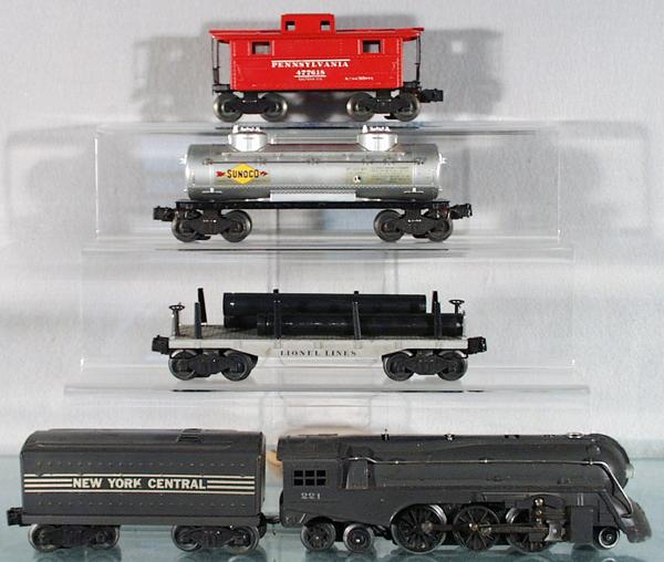 LIONEL 1403W TRAIN SET: O ga, 221 loco, 221W tender, 2411 pipe flat, 2465 Sunoco tank, some decal chips, 2472 caboose, orig boxes & set box worn, C7-8.