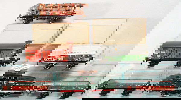 MARKLIN TRAIN SET: O ga, handpainted tin, RV12890 loco, w/cars 17720 log car, 17910 box car, 2 #17720 gondolas, beds repainted, 17610 gondola w/cloth canopy, lot has 2 unnumbered orig boxes, C4-7.