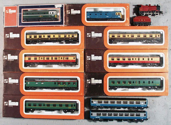 LIMA BRITISH TRAIN LOT: HO ga, 2-rail, 5115M diesel, 8049M diesel, LMS loco & tender, w/2 Inter-City coaches & cars 9151, 9320, 9327, 9235, 9152, 9145, 9233, 9 orig boxes only, boxes have minor wear, C7-9.