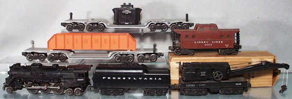 LIONEL TRAIN SET: O ga, 2037 loco, orig box, 2671W tender, 2460 crane, 6418 machinery car, 6518 transformer car, missing 1 brakewheel, 3 broken insulators, 6417 caboose, missing 1 step, C5-6.