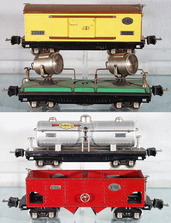 4 LIONEL FREIGHT CARS: O ga, 814 box car, 820 searchlight, 815 Sunoco tank, 816 hopper, nickel trim, C5-6.