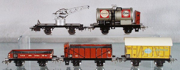 MARKLIN FREIGHT CARS: HO ga, 366 crane, missing hook, 374 Esso tank, 364 gondola, 371K gondola w/doors, 382 bananas, roof restored, all wheels replaced, C6-8.