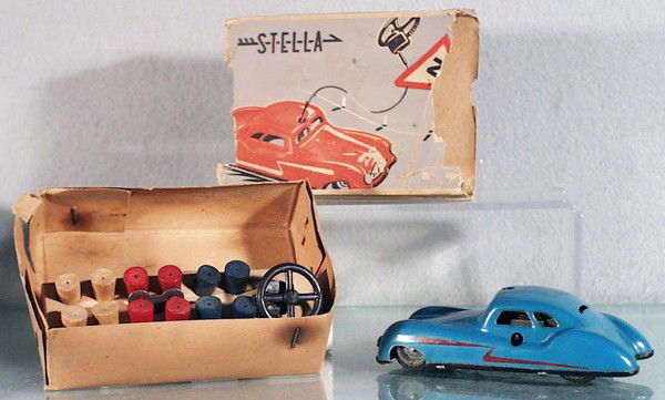 STELLA SCHUCO-COPY AUTO: litho tin, clockwork, working, copy of Schuco 3000 auto, die cast hubs fatiguing, w/accessories, orig box rough, C6-7.