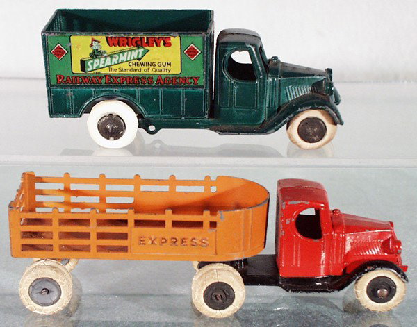 2 TOOTSIETOY MACK TRUCKS: 810 Wrigley's, 801 Stake Truck, both are missing front bumpers, C5-6.