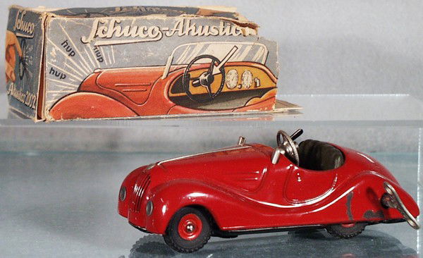 SCHUCO 2002 AKUSTICO: litho tin, red, clockwork working, paint worn by key hole, orig box worn, C6-7.