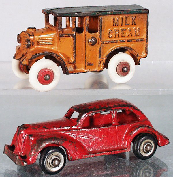 2 HUBLEY VEHICLES: painted cast iron, Milk & Cream Truck, 3 1/2" long, Packard Coupe, 4 1/2" long, C4-5.