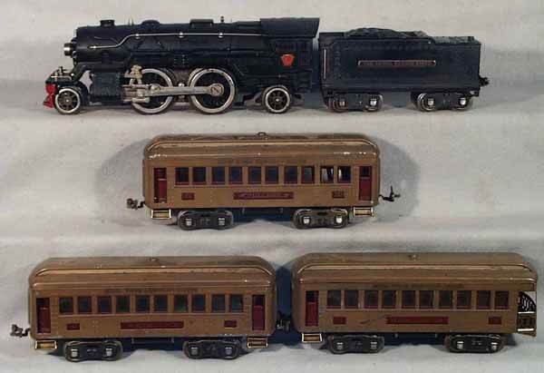 LIONEL TRAIN SET: std ga, 1835E loco, missing boiler latch, some surface oxi on wheels & trim, 1835W tender, surface oxi on trucks, 2 #337 Pullmans, 1 w/paint flaking on1 side, dent in roof, 338 obsv, paint flaking on