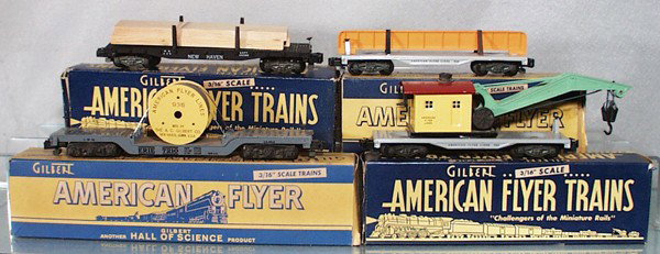 4 AMERICAN FLYER FREIGHT CARS: S ga, 928 log car, 909 girder car, 936 cable reel flat, 906 wrecking crane, orig boxes minor wear, C7-9.