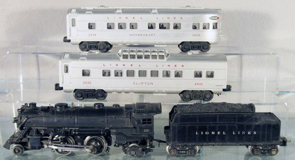 LIONEL TRAIN SET: O ga, 229 loco, 1 cowcatcher step chipped, 2666W tender, 2432 Clifton vista dome, 2436 Mooseheart obsv, C5-6.