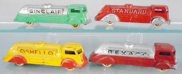 4 TOOTSIETOY GAS TRUCKS: 1007 Sinclair, 1006 Standard, 1009 Shell, 1008 Texaco, rubber tires worn, C5-6.