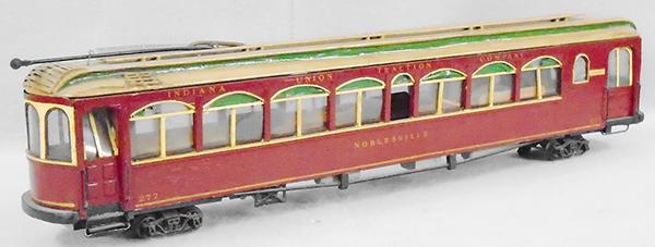 INDIANA INTERURBAN COACH: 2 ga, wood, 30 in long, handmade, labelled Indiana Union Traction Company and Nobelsville, no motor on plastic trucks, small damage to car because of handling & drying glue, C6-7.
