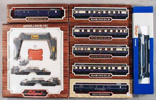 ROCO & LILIPUT TRAIN SET: HO ga, Roco Loco, 3-rail, w/6 Liliput coaches & 1 freight set, orig boxes minor wear, C7-9.