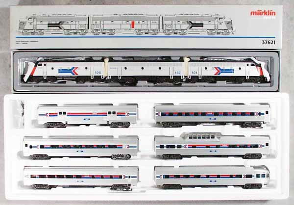 MARKLIN AMTRAK TRAIN SET: HO ga, 37621 EMD F7 diesel, w/43600 6-piece car set, orig boxes & inserts, tops have waterdamage, C9-10.