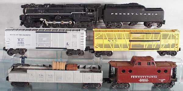 LIONEL TRAIN SET: O ga, 682 turbine loco, stripe repainted, 2046W-50 tender, 6464 RI box car, steps chipped, 6356 stock car, 3562-25 barrel car, oxidation in chute, 6417 caboose, handrails broken, C5.