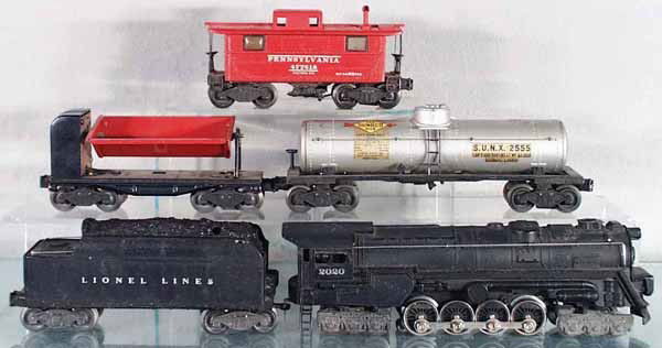 LIONEL TRAIN SET: O ga, 2020 turbine loco, 2466W tender, crack in side repaired & touched up, 2555 Sunoco tank, decals yellowed, 3559 dump, 2457 caboose, all have flying shoe trucks, C5.