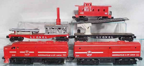 LIONEL TRAIN SET: O ga, 229 M&StL Alco AA, front bumper cracked, 3413 rocket launcher, railing cracked & broken, rocket replaced, 6512 cherrypicker car, missing top, 6059 caboose, C5-6.