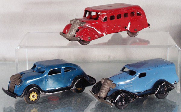 3 MARX VEHICLES: painted pressed steel, Bus, 6" long, Airflow, 5 1/2" long, Panel Truck 5 1/2" long, friction working, grille tarnished, C5-6.