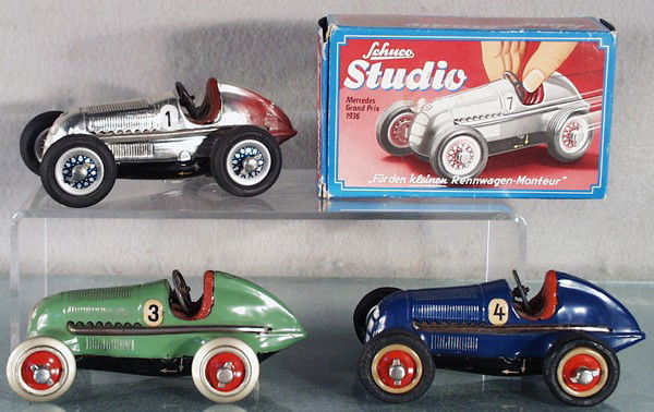 3 SCHUCO 1050 STUDIO RACERS: litho tin, clockwork working, contemporary version w/accessories & orig box, 2 US Zone versions, 1 missing rubber tires, C6-8.