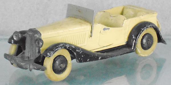 DINKY 24G SPORTS TOURER: cream & black, tires worn, some die cast cracks, X frame, ca 1934-40, C6.