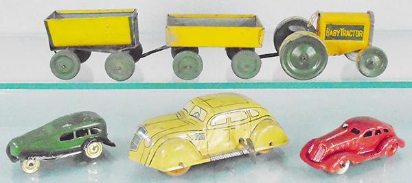 4 TIN TOYS (1 of 2)