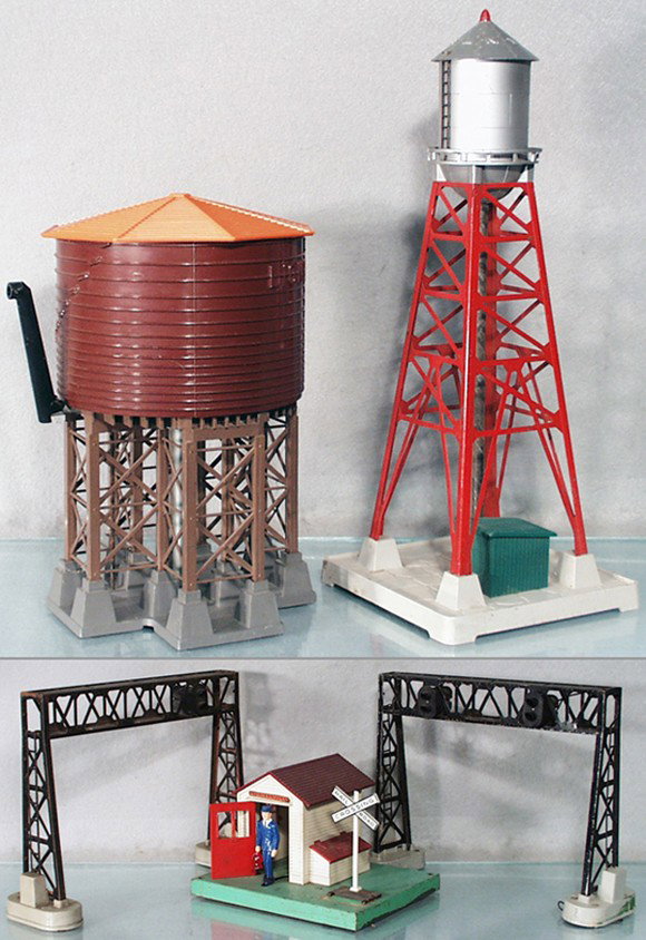 5 LIONEL ACCESSORIES: O ga, 138 water tower, 193 industrial water tower, crack in 1 railing, 2 #450 signal bridge, 1 missing light set, layout paint on base, 45 gateman, C4-5.