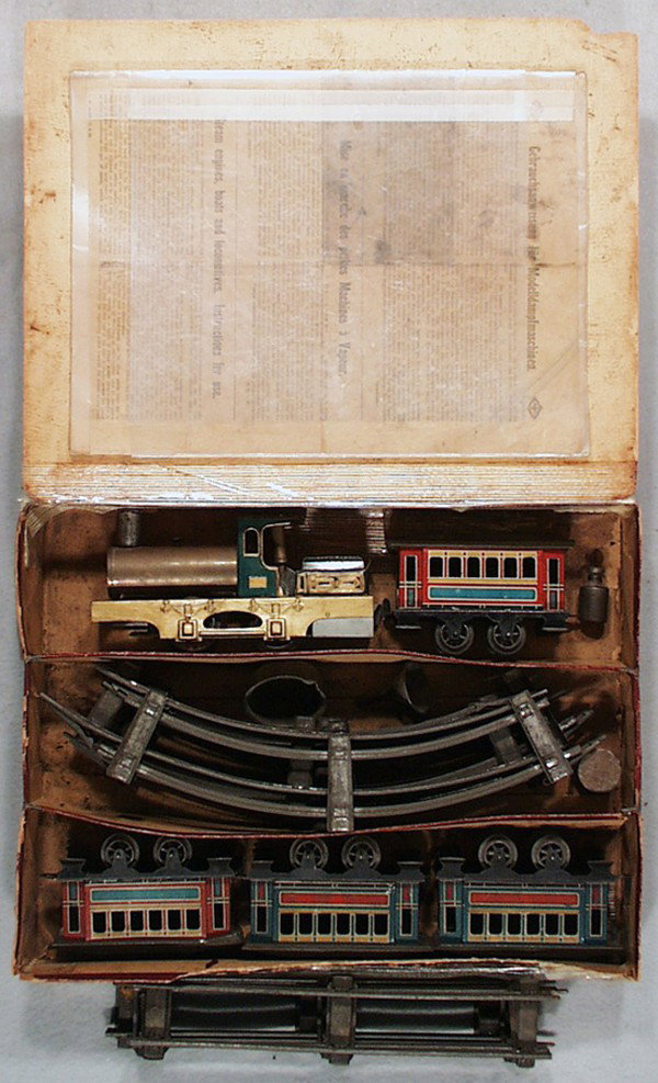 CARETTE LIVESTEAM TRAIN SET: O ga, livesteam loco repainted, w/4 coaches, track & instructions, orig set box taped, C4-6.