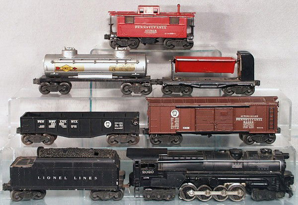 LIONEL TRAIN SET: O ga, 2020 turbine loco, small dent in cowcatcher, 2466WX tender, 2452 gondola, 2458 box car, 3559 coal dump, 2465 Sunoco tank, decals have edge chips, frame repainted, 2457 caboose, all have flying s