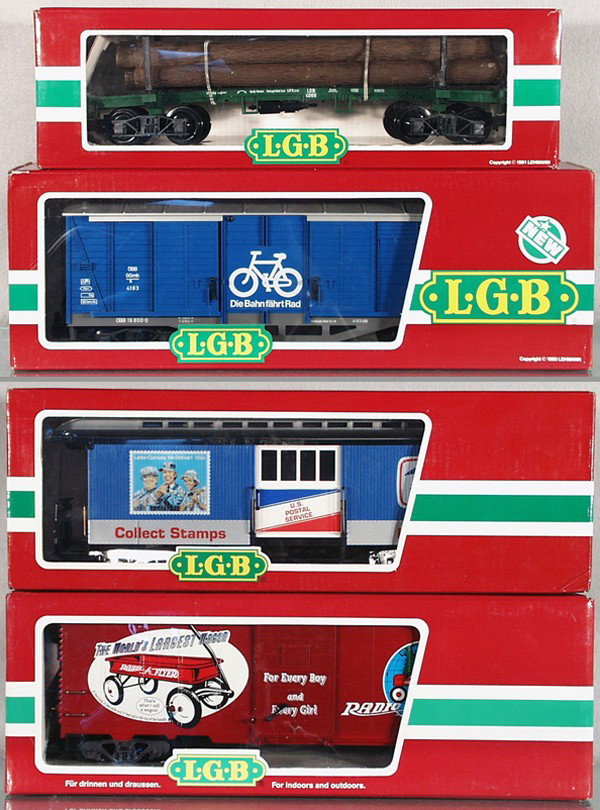 4 LGB FREIGHT CARS: G ga, 4066 log car, 4163 box car, 31840 USPS box car, 40915 Radio Flyer box car, orig boxes minor wear, no inserts, C8-9.