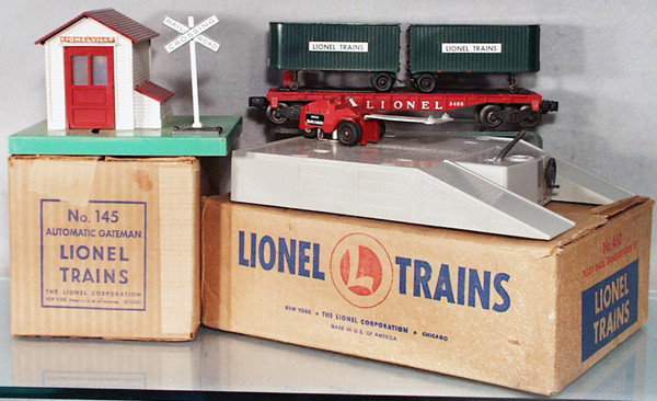 2 LIONEL ACCESSORIES: O ga, 145 gateman, 460 piggyback transportation w/3460 flat w/trailers, some oxidation on base, orig boxes minor wear, C5-6.