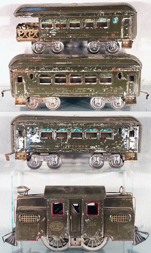 LIONEL TRAIN SET: std ga, 38 loco, w/pedestal headlight, 2 #35 Pullmans, 36 obsv, cars have ribbed sides w/embossed Mfg, heavy play wear, C2-4.